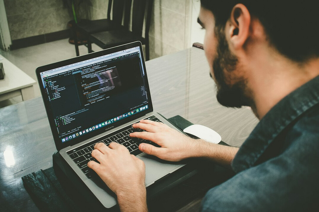 programmer writing code